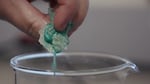 In this video still from January, the isomalt-cellulose-sawdust composite material breaks down into its plant-based components. Unlike plastic, it only takes a few hours of soaking in water for the material to dissolve completely.