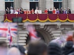 Royals gather on the balcony of Buckingham Palace to view a flypast by aircraft from the Royal Navy, Army Air Corps and Royal Air Force following the coronation of King Charles III and Queen Camilla on Saturday in London.