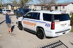 Harris County Sheriff's officers arrive in the neighborhood where 42-year-old suspect Shamsud-Din Bahar Jabbar is believed to have lived in Houston.