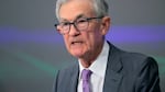 This photo shows Federal Reserve Chair Jerome Powell from about the shoulders up. He's wearing a dark gray suit jacket with a white shirt and lavender tie.