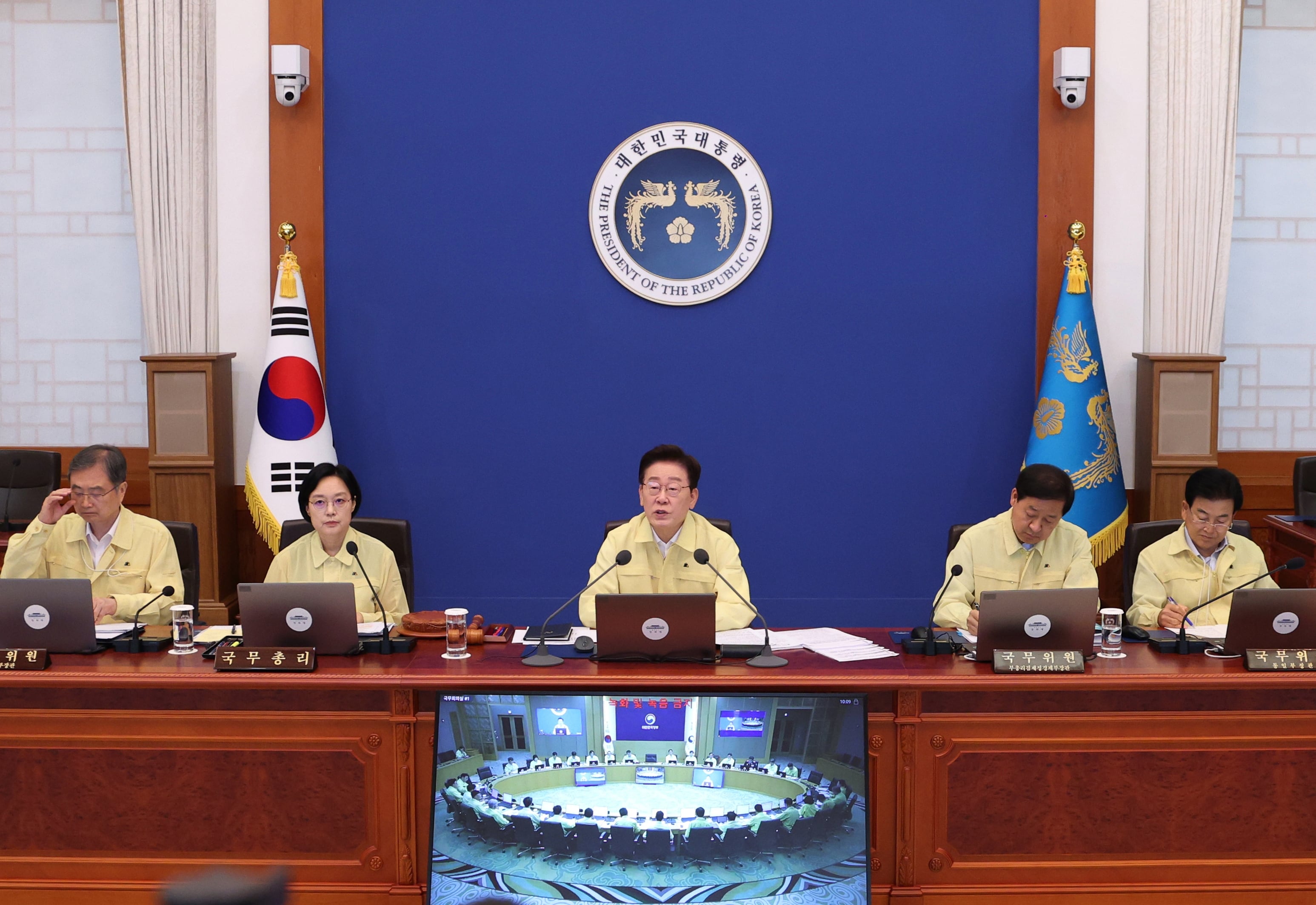 South Korean President Lee Jae Myung, center, speaks during a cabinet meeting at the presidential office in Seoul, South Korea, Tuesday, Aug. 18, 2026.