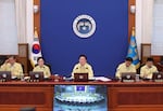 South Korean President Lee Jae Myung, center, speaks during a cabinet meeting at the presidential office in Seoul, South Korea, Tuesday, Aug. 18, 2026.