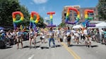 Participants carry balloons spelling out "Pride" during the 51st LGBTQ Pride Parade in Chicago on June 26, 2022.