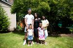 LaTasha Taylor, center, with her children, from left, Roshellio, 18; Saniyah, 3; Sarai, 6; and Ki'Mya, 10 (Kielondre, 16, not pictured) at their home in Portland, Ore., Friday, June 19, 2020.