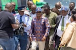 South African Minister of Police Senzo Mchunu and South African Minister of Mineral Resources Gwede Mantashe (R) inspect the site alongside senior members of the South African Police Service on January 14, 2025.