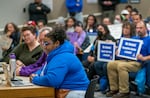 Angela Bonilla, president of the Portland Association of Teachers (PAT), right, speaks at the Portland Public Schools Board of Education meeting at the PPS district office in Portland, Nov. 7, 2023.