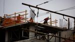 Construction crews work on the future Hyatt Regency hotel at the Oregon Convention Center in Portland, Oregon, Saturday, Jan. 5, 2019.