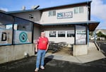 Robert Hoefs, the owner of Off the Hook Bar & Grill in Newport, Ore., is not a fan of all the urban renewal work, “My property value went down,” Hoefs said, pictured here on Feb. 8, 2024.