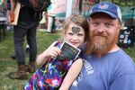 Lucy with her father, Alex Yusimov, enjoying the Kid's Punk Rock Matinee that they organized together.