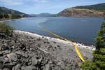 Emergency crews on June 4, 2016, found an oil sheen on the bank of the Columbia River near the site of an oil train derailment and spill in Mosier, Oregon, the day prior.