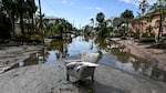 A flooded street with debris in the aftermath of Hurricane Milton, in Siesta Key, Fla., on October 10, 2024. The monster weather system sent tornadoes spinning across the state and flooded swaths of the Tampa Bay area after the storm rapidly intensified to a top-of-scale category 5 major hurricane.