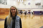 Sarah Griffin is the head coach for Sunset High School's girls' basketball team. When she's not coaching, she has another job and is pursuing a degree in school counseling. 
