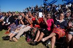 Attendees listen as Interior Secretary Deb Haaland speaks before President Joe Biden at the Gila Crossing Community School in the Gila River Indian Community reservation in Laveen, Ariz., Friday, Oct. 25, 2024.