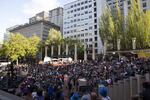 An estimated 2,000 people filled Pioneer Courthouse Square throughout the evening for Low Bar Chorale's Purple Rain sing.