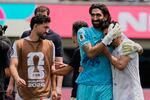 Iran players react at the end of the World Cup Group G soccer match between Belgium and Iran in Inglewood, Calif., near Los Angeles, Sunday, June 21, 2026.