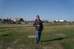 Dino Giacomazzi stands on his Central Valley farm, which depends on groundwater to grow almonds, lettuce and tomatoes for pizza sauce.