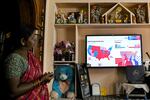 A villager watches the 2024 US presidential election poll results inside a house in Vadluru, the ancestral village of Usha Vance's parents, wife of US Senator and Republican vice presidential candidate J.D. Vance, at the West Godavari district in India's Andhra Pradesh state on November 6.