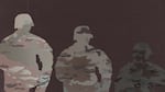 A collage of three silhouettes of a soldier filled in with a camouflage pattern, slowly becoming blurrier and less transparent from left to right.