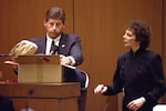 FILE - Los Angeles Police Detective Mark Fuhrman shows the jury in the O.J. Simpson double murder trial evidence during testimony Friday, March 10, 1995, in Los Angeles.
