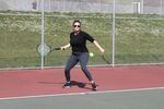 Writer Brooke Bass takes a break from working at home on the Gabriel Park tennis courts. 