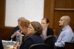 Lead defense attorney Therese Lavallee, foreground, is seated before opening statements in the aggravated murder trial of defendant Guillermo Raya Leon, right, at the Clark County Courthouse on Friday afternoon, Sept. 8, 2023.