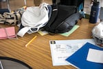 Students’ backpacks strewn about while they get to know one another in Harriet Tubman Middle School in Portland, Ore., Aug. 26, 2025. Following the Portland School District’s new cell phone policy, students have expressed mixed feelings about whether it will have a positive impact on their school environment.