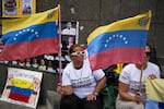 People who consider their detained family members to be political prisoners protest for their releases outside the United Nations office in Caracas, Venezuela, Wednesday Feb. 18, 2026.