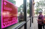 A sign noting the first stop on the No Vacancy Window Gallery’s art walk through Old Town Portland, Ore., Sept. 4, 2025. No Vacancy is a project that turns the windows of vacant buildings into exhibition venues for Portland artists, with the intent of boosting foot traffic and community engagement in the neighborhood. 