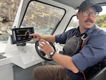 Jeremey Varley, the Idaho State Department of Agriculture’s southern chief treatment engineer, explains the state’s strategy for eradicating invasive quagga mussels during a boat tour of the infested portion of the Snake River on Oct. 3, 2025.