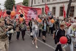 Marchers carried photographs of their ancestors and a banner featuring Josef Stalin on the Soviet flag during a Victory Day march of the Immortal Regiment, in Chișinău, Moldova, May 9.