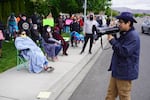 Northwest Justice Project Attorney David Morales addresses striking Matson Fruit workers on May 13 to inform them of labor rights and ask for testimonies of working conditions on the production line.