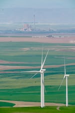 FILE - Energy produced by wind turbines and solar panels utilize the existing transmission lines from the former Boardman Coal Plant.