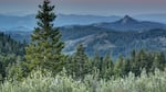 This view from the Pacific Crest Trail in the Cascade-Siskiyou National Monument includes the sun, moon, Mount Shasta and Pilot Rock.