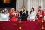 June 14, 2014: Members of the British royal family watch the fly-past as they stand on the balcony of Buckingham Palace following the Trooping the Colour. From left: Queen Elizabeth II; Prince Philip, Duke of Edinburgh; Prince Edward, Earl of Wessex; Prince Harry; Catherine, Duchess of Cambridge; and Prince William, Duke of Cambridge.
