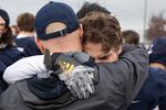 Lake Oswego players, family and coaches console each other after the loss. The Central Catholic Rams played the Lake Oswego Lakers at Hillsboro Stadium in Hillsboro, Oregon, on Dec. 7, 2019. The Rams defeated the Lakers 49-28.