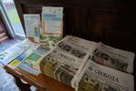 Stacks of the UNA’s newspaper, <em>The Ukrainian Weekly</em>, or <em>Svoboda</em> in Ukrainian, sit for the taking in the Main House next to Soyuzivka’s event calendars.