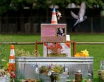 A memorial for June “T-Rex” Knightly, at the corner Northeast Hassalo Street and Northeast 55th Avenue in Portland, April 5, 2023. Knightly died after being shot by Benjamin Smith in 2022. Smith pleaded guilty to second-degree murder and other charges, and is awaiting sentencing. 