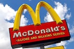 FILE - The sign outside a McDonald's restaurant is seen in Pittsburgh, June 25, 2019.