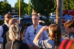 Portland Mayor Ted Wheeler speaks with citizens at the Hollywood vigil.