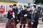 Members of the Portland Police Highland Guard prepare to lead the memorial procession for slain Seaside Police Sgt. Jason Goodding.