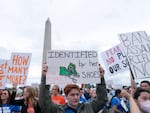 People participate in the second March for Our Lives rally in support of gun control in front of the Washington Monument on Saturday in Washington.