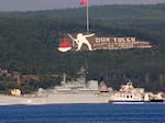 A Russian ship named Caesar Kunikov passes through the Dardanelles strait in Turkey en route to the Mediterranean Sea, on Oct. 4, 2015.