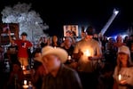 People attend a vigil for Charlie Kirk at Western Trails Ranch in Morristown, Ariz., on Saturday.