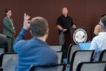 Jason Anderson, senior fire investigator with Portland Fire & Rescue, responds to questions at a press conference following the Centennial Mills building fire on Aug. 10, 2026, in Portland, Ore. Demolition is set to start on the building on Aug. 14, after a fire made the structure unsafe.