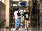 FILE - Two Jefferson High School students walk to lunch together in Portland, Ore., Aug. 26, 2025.