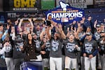 Tampa Bay Rays pitcher Freddy Peralta hold the MVP trophy after their win against the Cleveland Guardians in Game 6 of an American League Championship Series baseball game in St. Petersburg, Fla. Monday, Oct. 19, 2026.