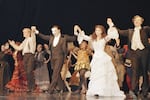 Steve Barton (from left), Michael Crawford and Sarah Brightman during the curtain call at the end of the premiere performance of The Phantom of the Opera on Jan. 26, 1988 at New York's Majestic Theatre.