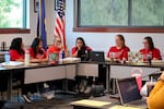Leslie Lomeli (left), Anita Chuc, Lesly Muñoz, Magali Hernandez, Catherine Celestino and Kathy Mincer (right) present a new article proposal for the union's employee contract during a bargaining session at the Woodburn School District office on Oct. 16, 2025. All of the panelists are educators and members of the union's bargaining team, except for Muñoz, who is an Oregon Education Association consultant and an elected state representative.