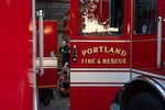 Portland Fire & Rescue firefighter Todd Deweber gets ready for the second part of his 48-hour shift at Station 1, on Sept. 11, 2026. Working as a firefighter on the anniversary of the attacks “makes it more real,” said Deweber, who was a teenager in 2001.