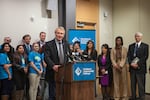 Gov. John Kitzhaber signs education bills.